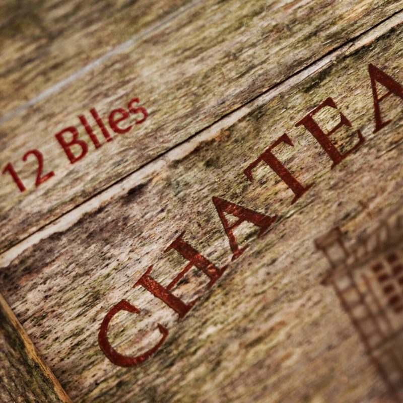Close up of a sign on a wooden wine box
